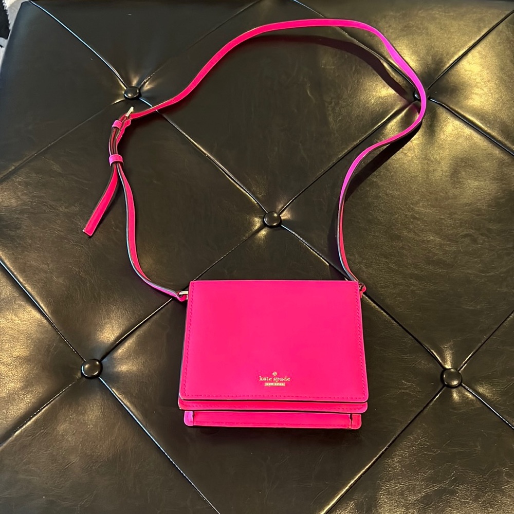 Kate Spade hot pink small crossbody. Only carried 1 time. Like new.